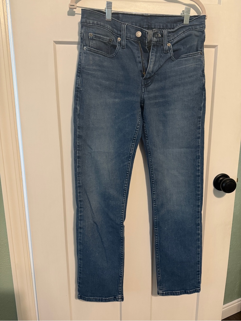 Levi's blue denim jeans with tan leather patch